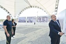 Президент Ильхам Алиев и Первая леди Мехрибан Алиева приняли участие в церемонии закладки фундамента жилого квартала, который будет построен в городе Агдам для бывших вынужденных переселенцев (ФОТО/ВИДЕО)