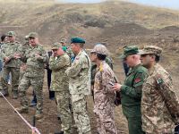 Military attachés accredited to Azerbaijan examine mass burial site found in Edilli village (PHOTO)