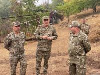 Military attachés accredited to Azerbaijan examine mass burial site found in Edilli village (PHOTO)