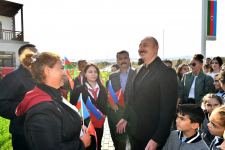 President Ilham Aliyev and First Lady Mehriban Aliyeva talk to residents of Aghali village, inquire about their conditions (PHOTO/VIDEO)