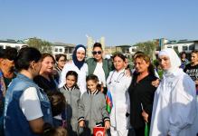 President Ilham Aliyev and First Lady Mehriban Aliyeva talk to residents of Aghali village, inquire about their conditions (PHOTO/VIDEO)