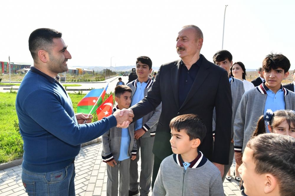 President Ilham Aliyev and First Lady Mehriban Aliyeva talk to residents of Aghali village, inquire about their conditions (PHOTO/VIDEO)