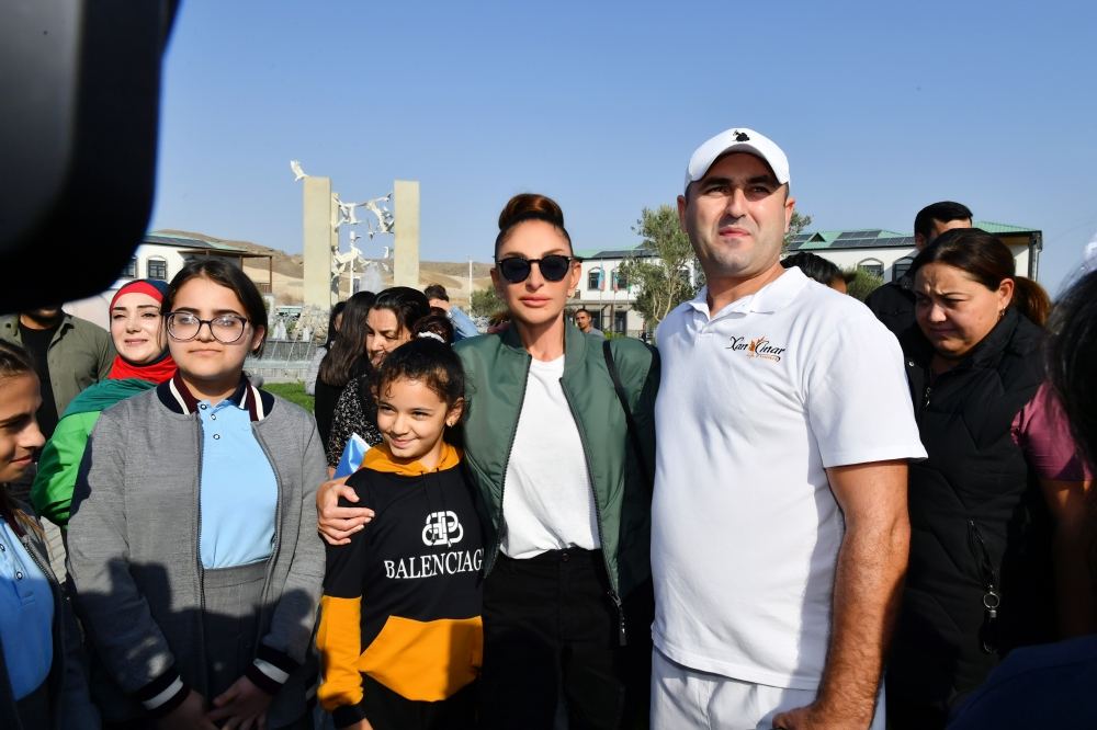 President Ilham Aliyev and First Lady Mehriban Aliyeva talk to residents of Aghali village, inquire about their conditions (PHOTO/VIDEO)