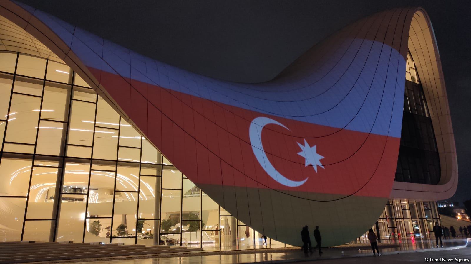 Building of Baku's Heydar Aliyev Center painted in colors of Turkish flag