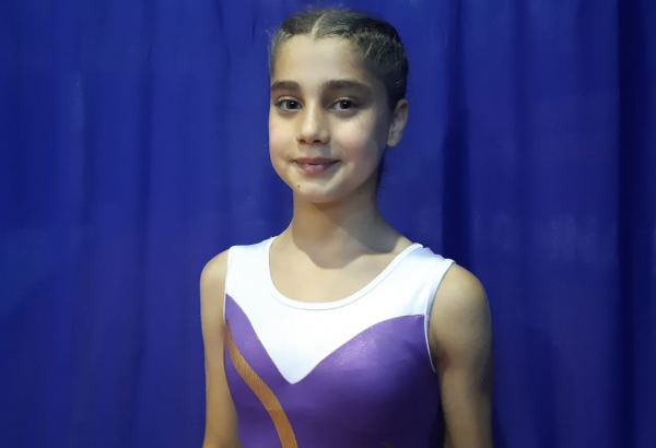 Young athlete talks on achieving high results in trampoline gymnastics