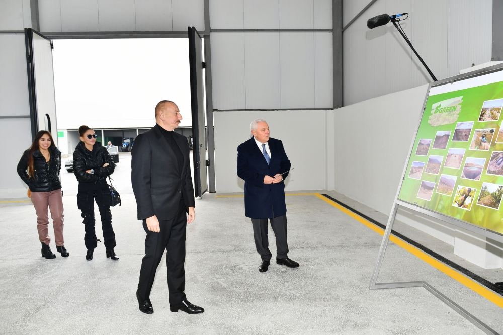 President Ilham Aliyev, First Lady Mehriban Aliyeva view conditions at dried fruit production enterprise in Shaki's Orta Zayzid village (PHOTO/VIDEO)