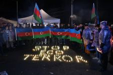 Participants of protest in zone of temporary responsibility of peacekeepers organize flash mob (PHOTO)