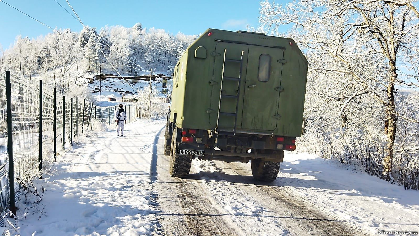 Ambulance, vehicle of Russian peacekeepers pass along Azerbaijan's Lachin-Khankendi road (PHOTO)