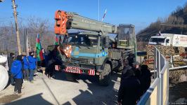 Supply vehicles of Russian peacekeepers pass along Azerbaijan's Lachin-Khankendi road (PHOTO)