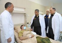 Azerbaijani defense minister visits military hospital on occasion of Novruz holiday (PHOTO/VIDEO)