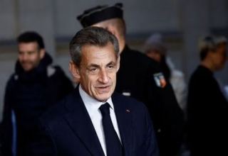 France's Sarkozy loses corruption appeal, must wear electronic tag