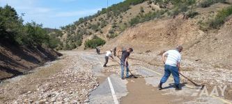 Устранены проблемы, вызванные селевыми потоками, на ряде дорог в Исмаиллы (ФОТО)