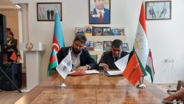 Подписан договор между туркомпаниями Азербайджана и Таджикистана (ФОТО)
