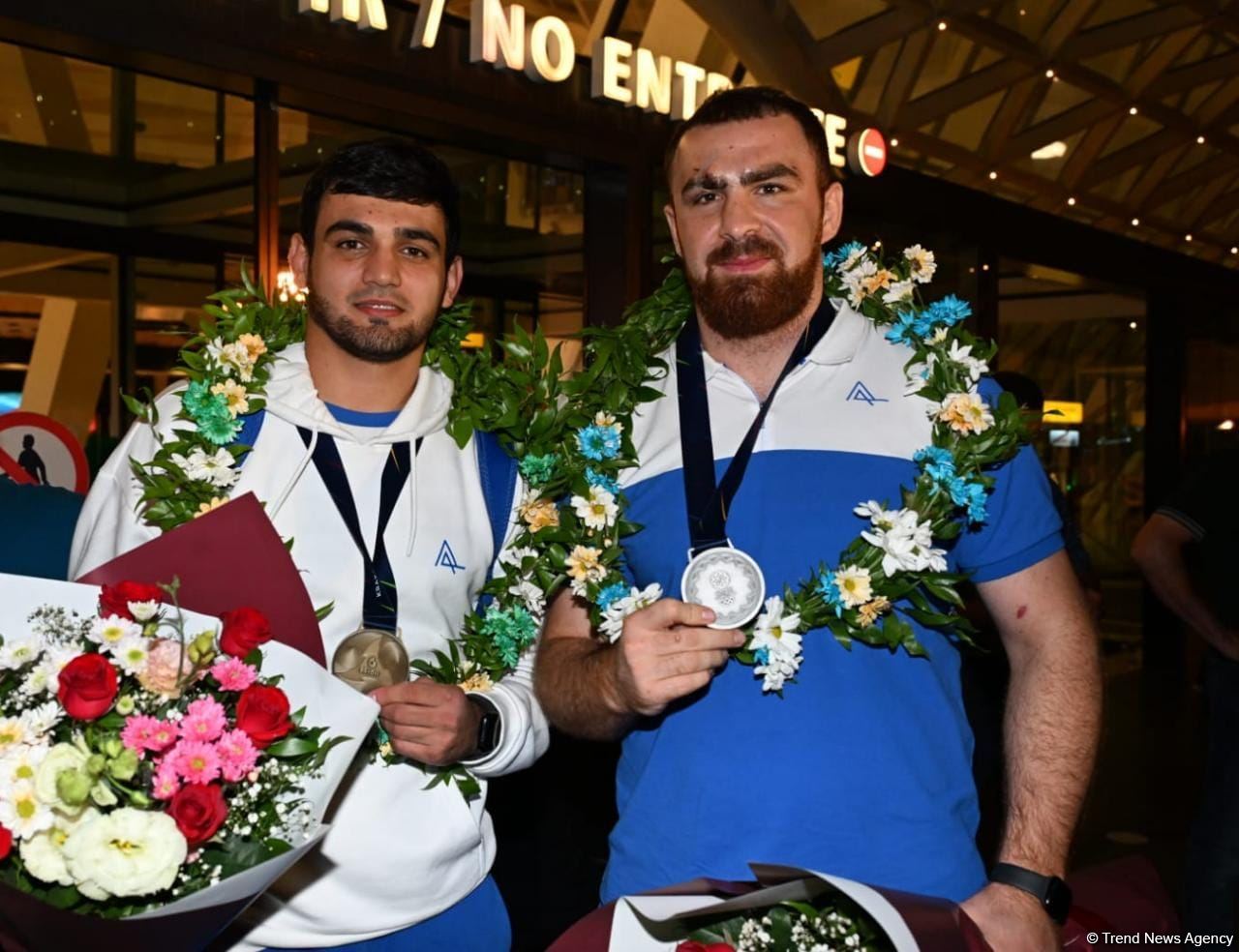 Azerbaijani athletes return home from III European Games in Poland (PHOTO)