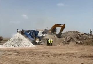 Azerbaijan uses mechanism of recycling salvaged materials for construction of roadbeds in Karabakh (VIDEO)