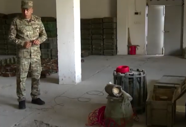 На военном складе на освобожденных землях Азербайджана обнаружены инженерные боеприпасы кустарного производства (ВИДЕО)