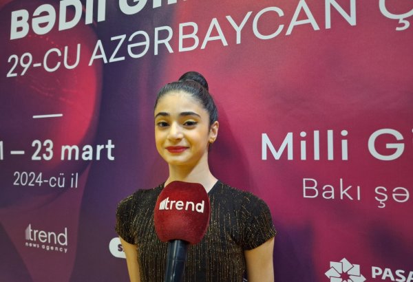 На чемпионате Азербайджана по художественной гимнастике царит замечательная атмосфера – юная спортсменка
