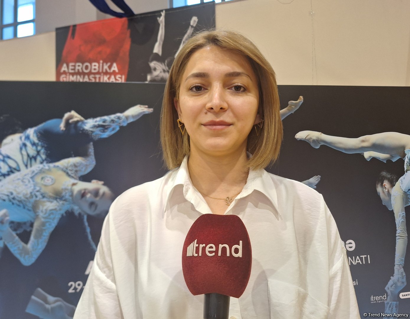 Члены сборной Азербайджана по акробатической гимнастике – спортсмены, демонстрирующие высокие достижения – тренер