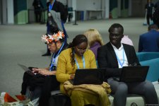 Фоторепортаж с четвертого дня COP29