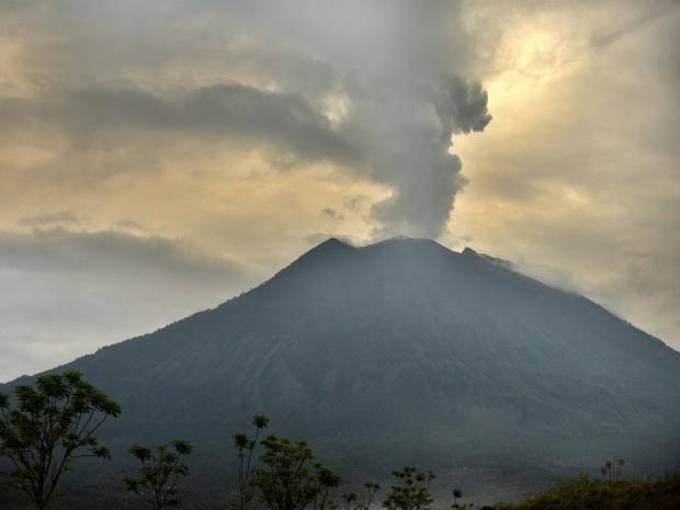 Indonesia shrinks danger zone around grumbling Bali volcano