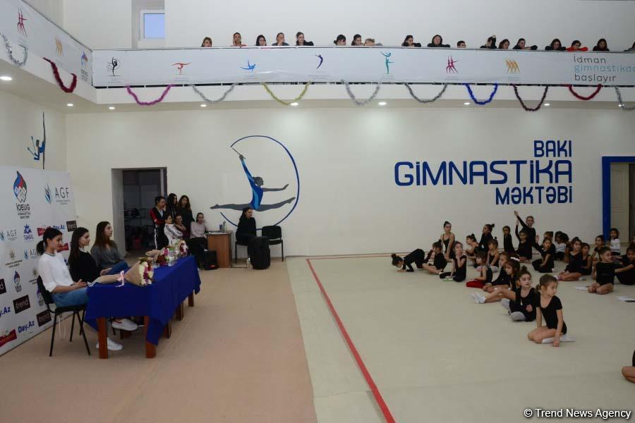 Bədii gimnastika üzrə Azərbaycan milli komandasının üzvləri gənc idmançılarla görüşüblər (FOTO)